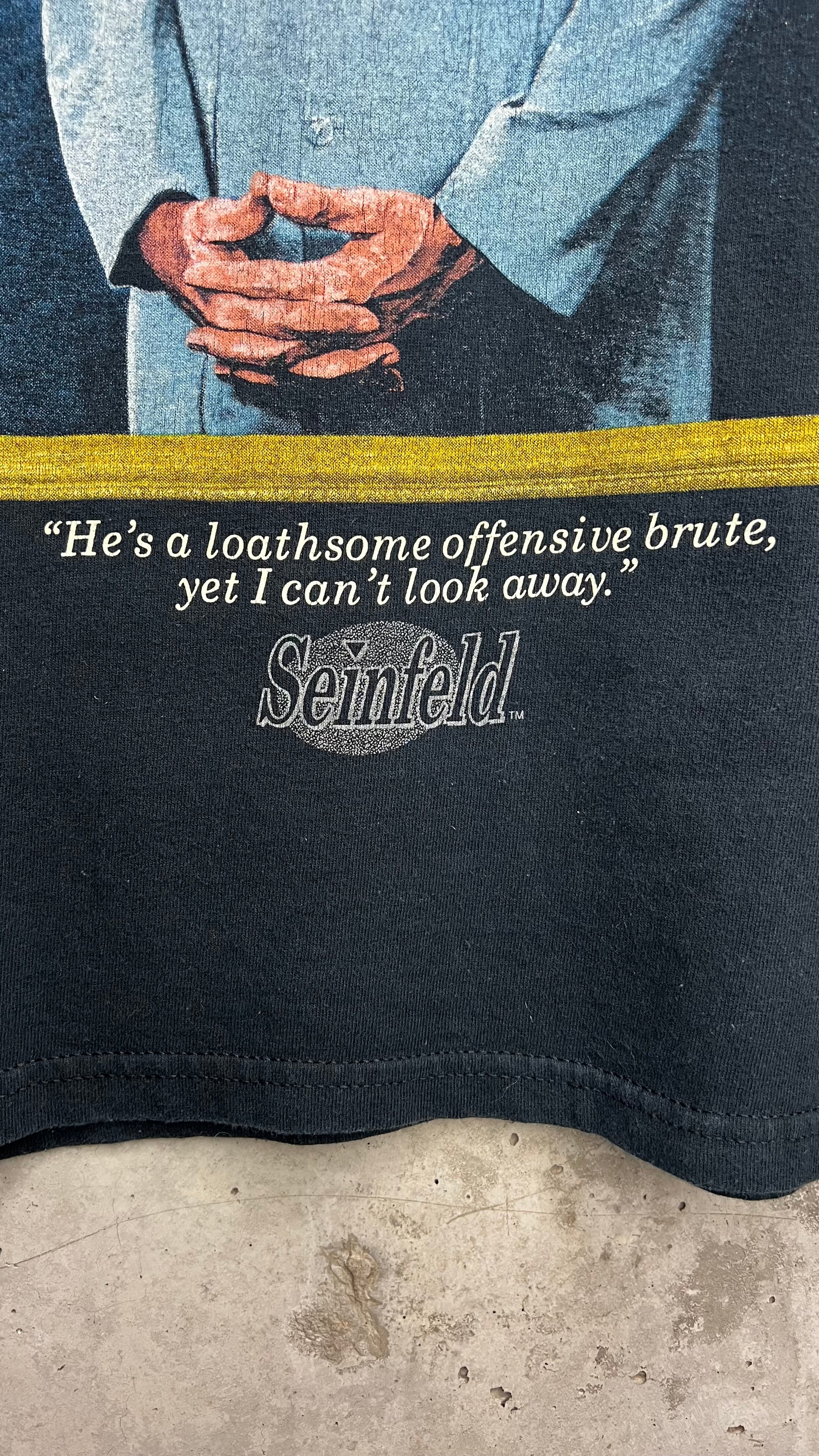SEINFELD KRAMER PORTRAIT TEE | “HE’S AN LOATHSOME OFFENSIVE BRUTE, YET I CAN’T LOOK AWAY”