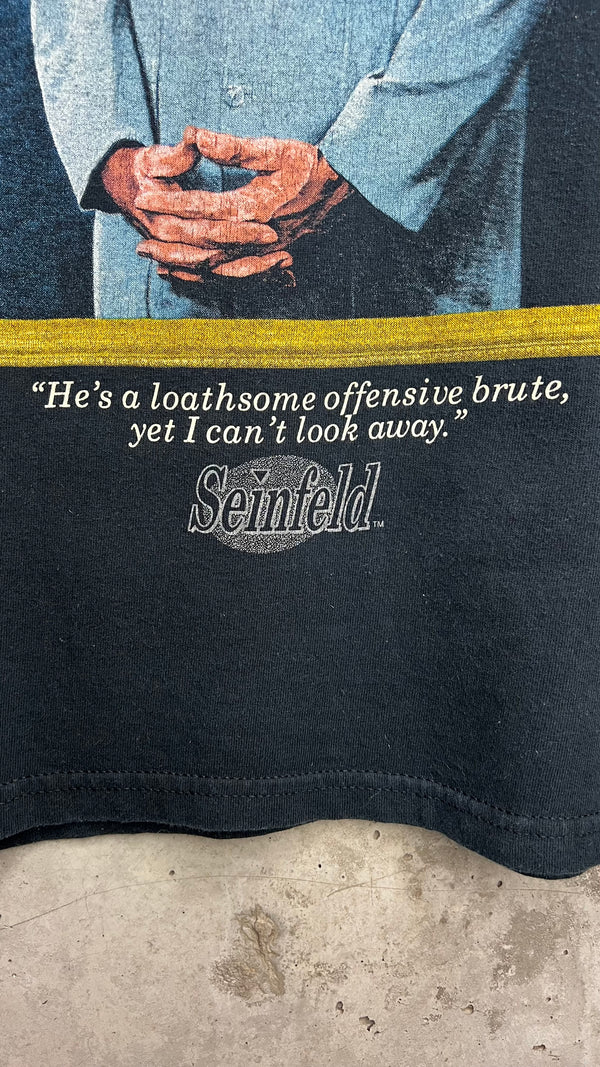 SEINFELD KRAMER PORTRAIT TEE | “HE’S AN LOATHSOME OFFENSIVE BRUTE, YET I CAN’T LOOK AWAY”