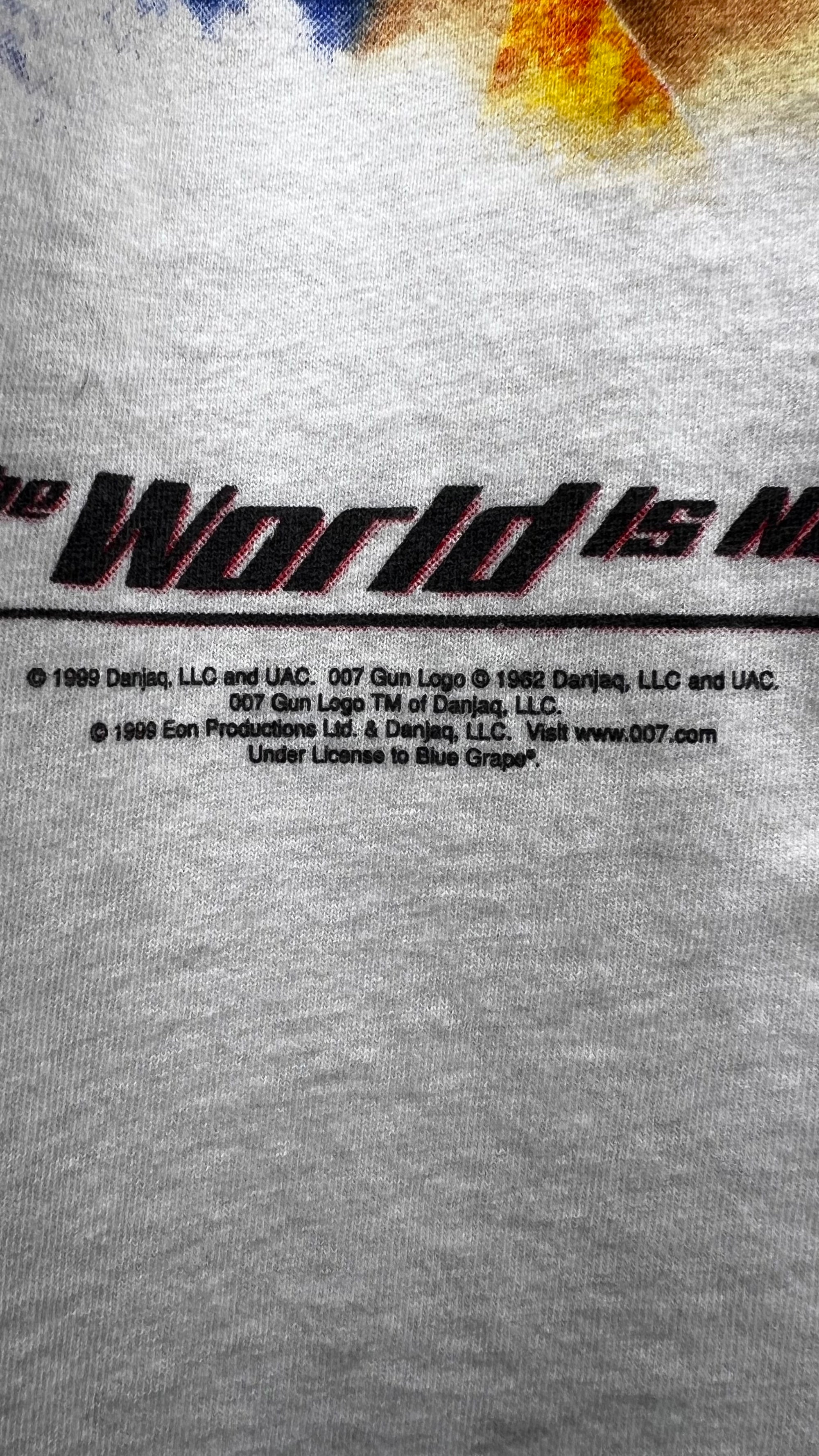 THE WORLD IS NOT ENOUGH MOVIE TEE | JAMES BOND | PIERCE BROSNAN