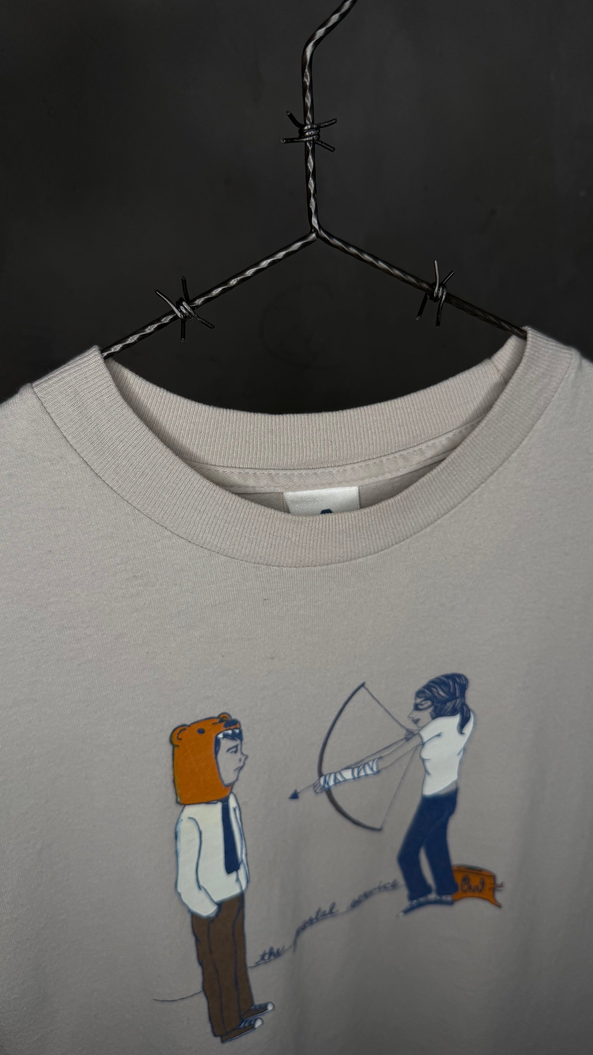 THE POSTAL SERVICE ARCHER TEE
