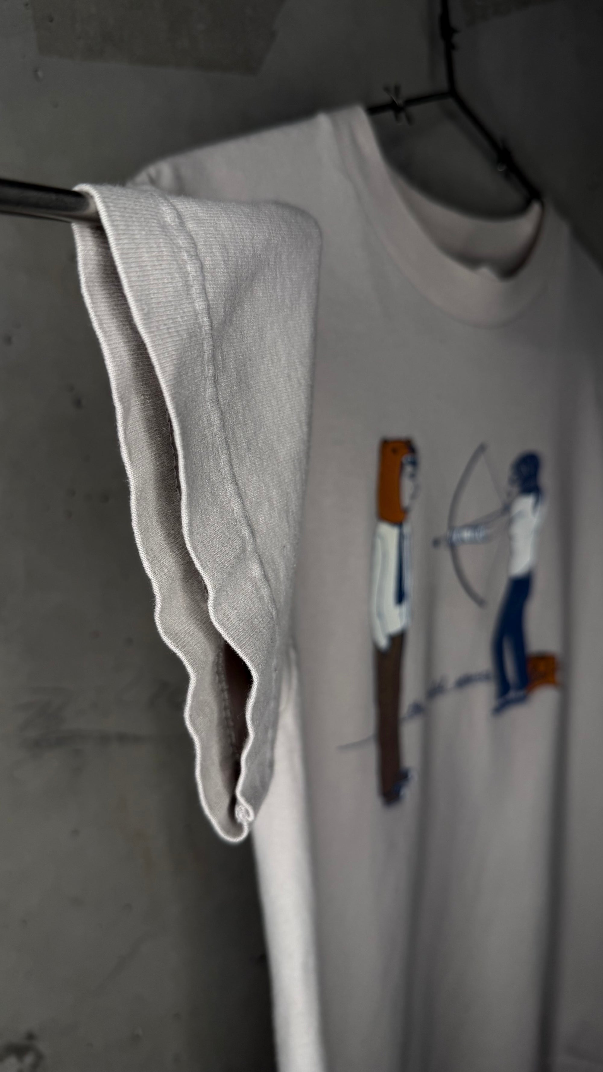 THE POSTAL SERVICE ARCHER TEE