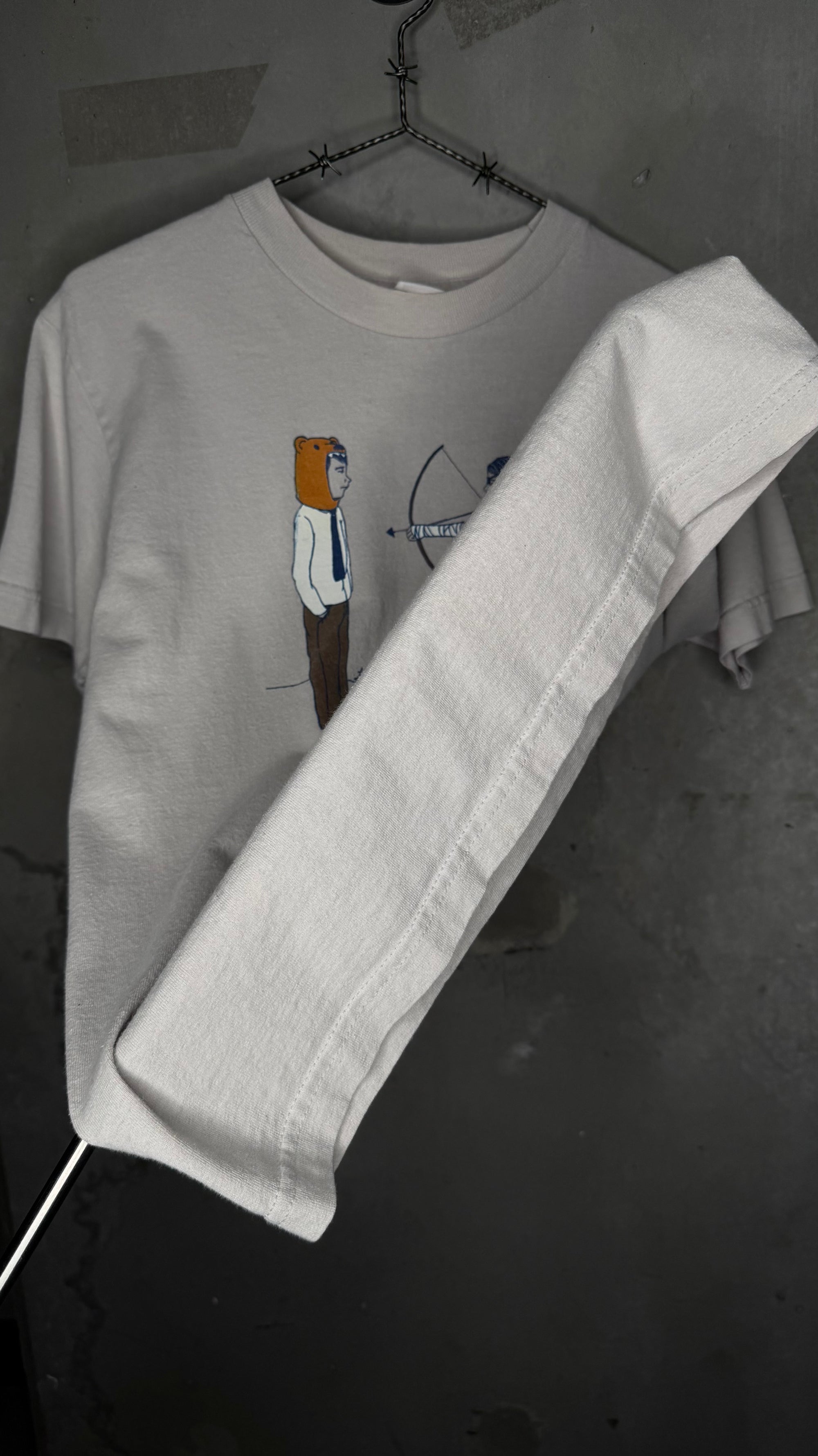 THE POSTAL SERVICE ARCHER TEE