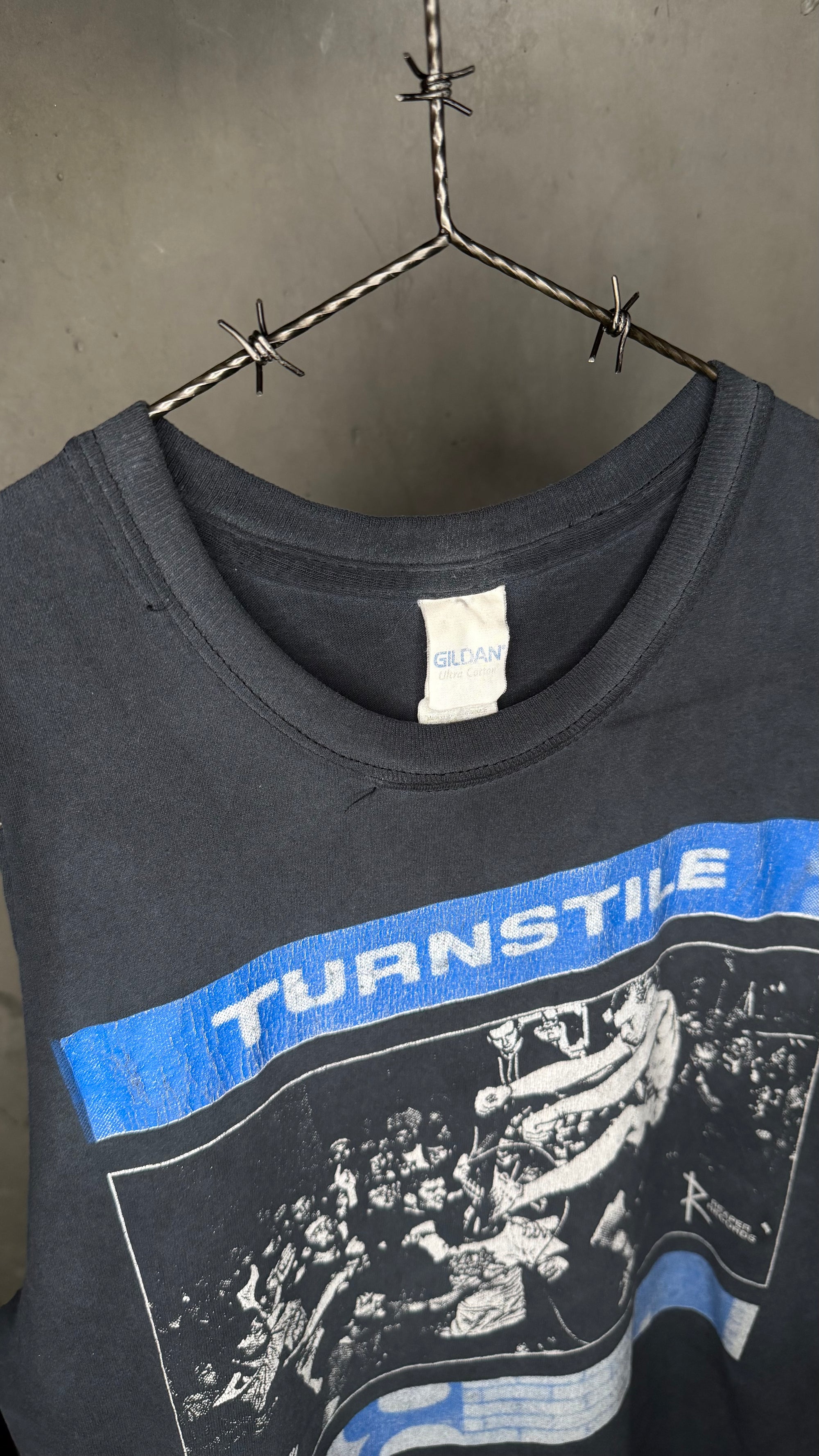 TURNSTILE ‘PRESSURE TO SUCCEED’ CUTOFF TEE | EARLY ERA REAPER RECORDS