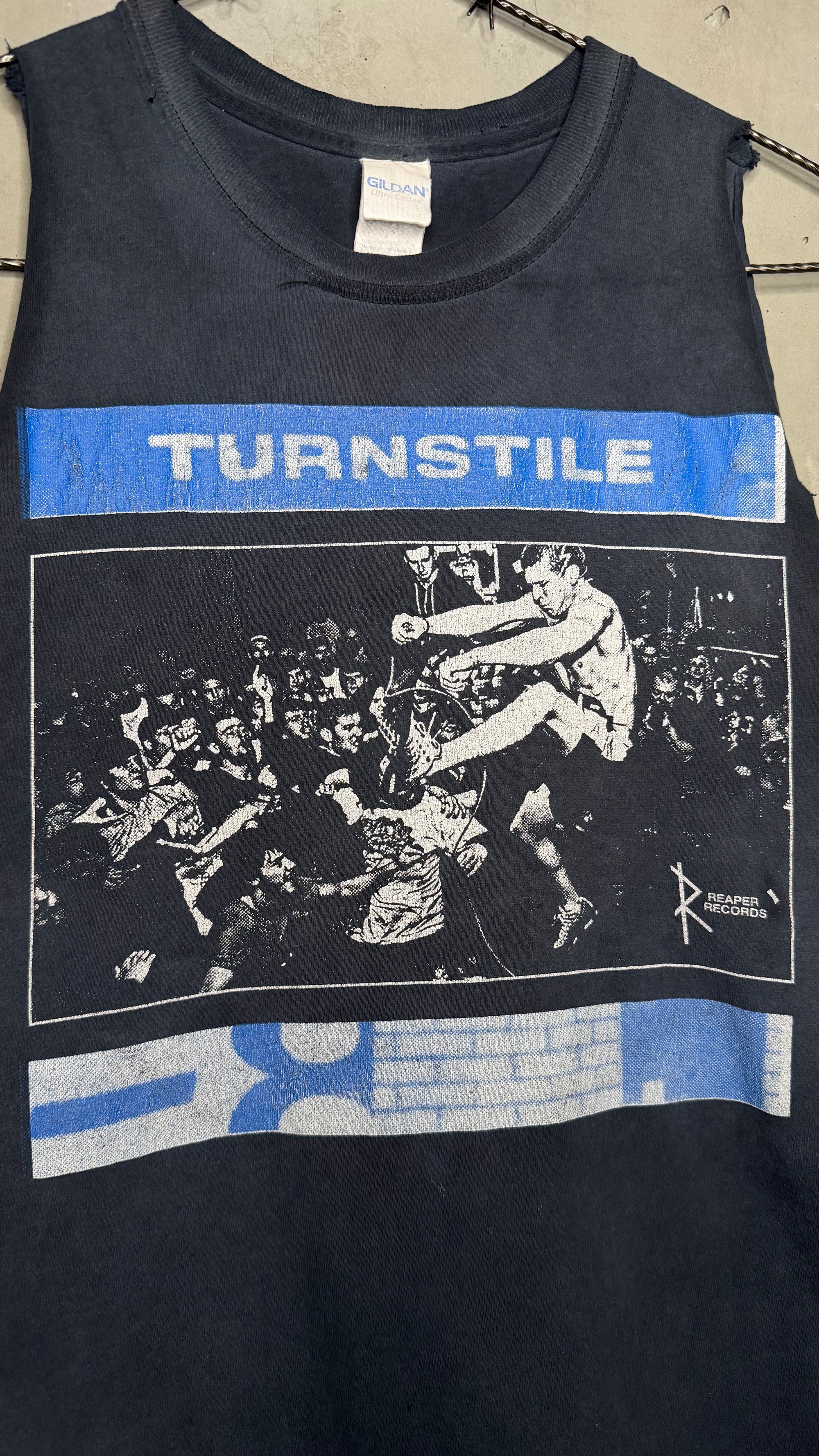 TURNSTILE ‘PRESSURE TO SUCCEED’ CUTOFF TEE | EARLY ERA REAPER RECORDS